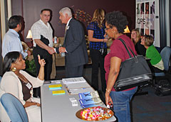 Employers QPS and Consult Sales speaking with potential job candidates.