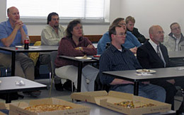 Interested students and graduates listen intently