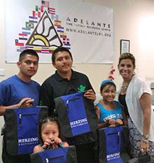 Herzing Donates Backpacks to Adelante