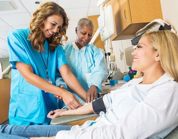 Nursing Student with Nurse Educator in School