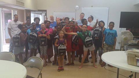 Herzing Gives Backpacks in Akron Ohio