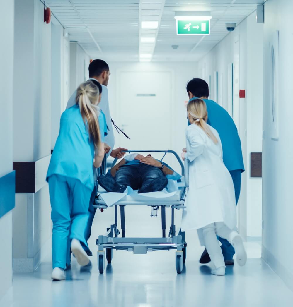 Acute Care Nurse Practitioner with Team of Doctors Acute Care Medical Team