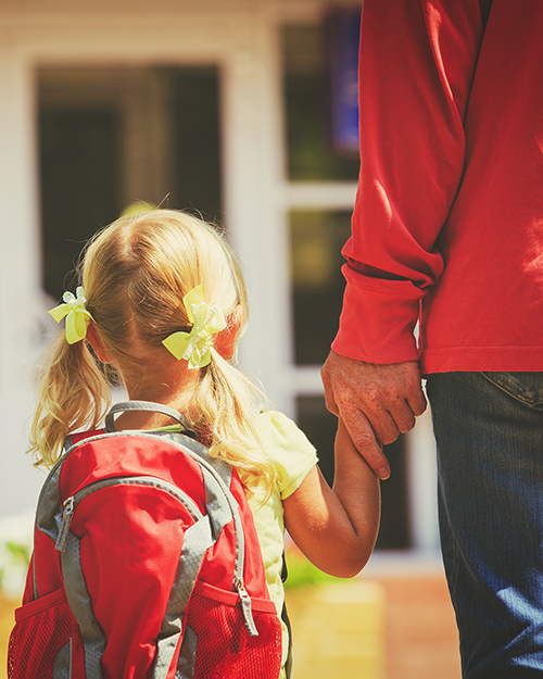 kid with backpack