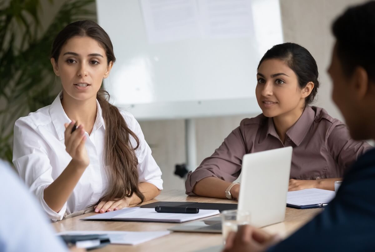 Marketing Manager in Meeting with Team Marketing Manager in Meeting with Team