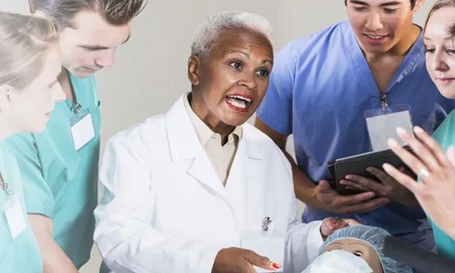 Nurse Educator Teaching Class of Nursing Students