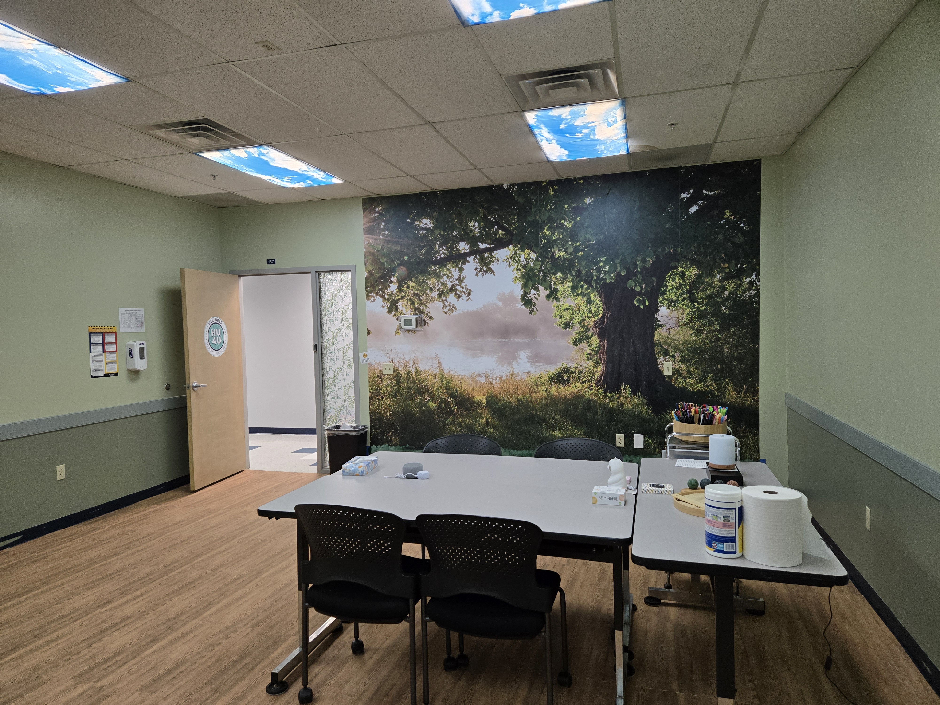 Herzing University Akron student wellness lounge with calming mural and study space