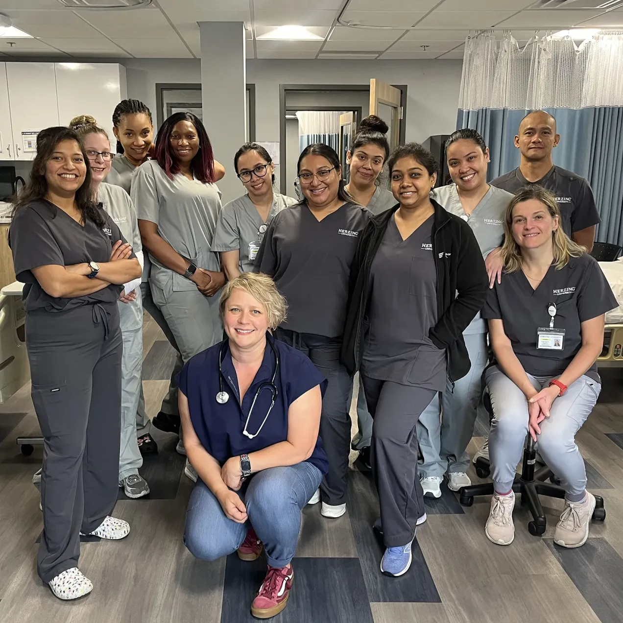 Group of Herzing nursing students in laboratory simulation experience