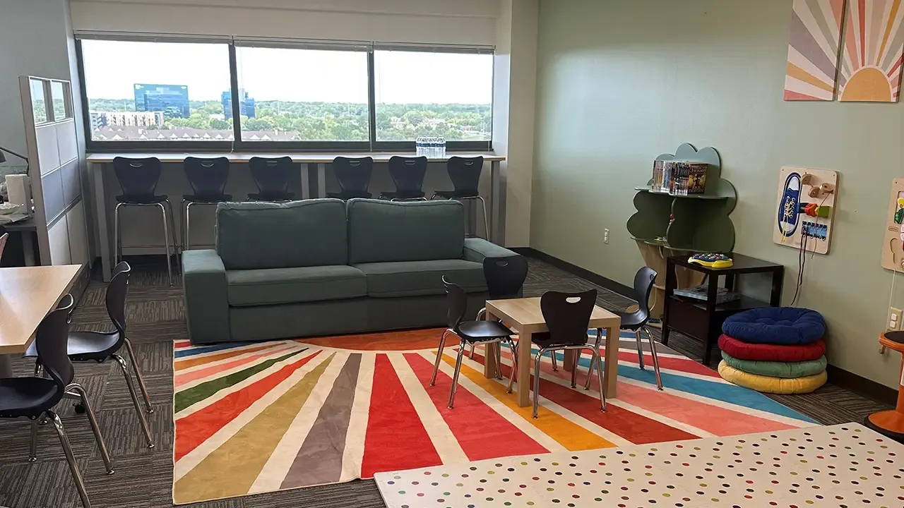 Herzing University Kenosha Center of Excellence for Veteran Student Success student lounge with seating and resources