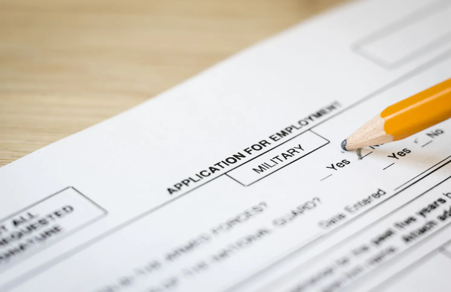horizontal close up image of a job application for the military department