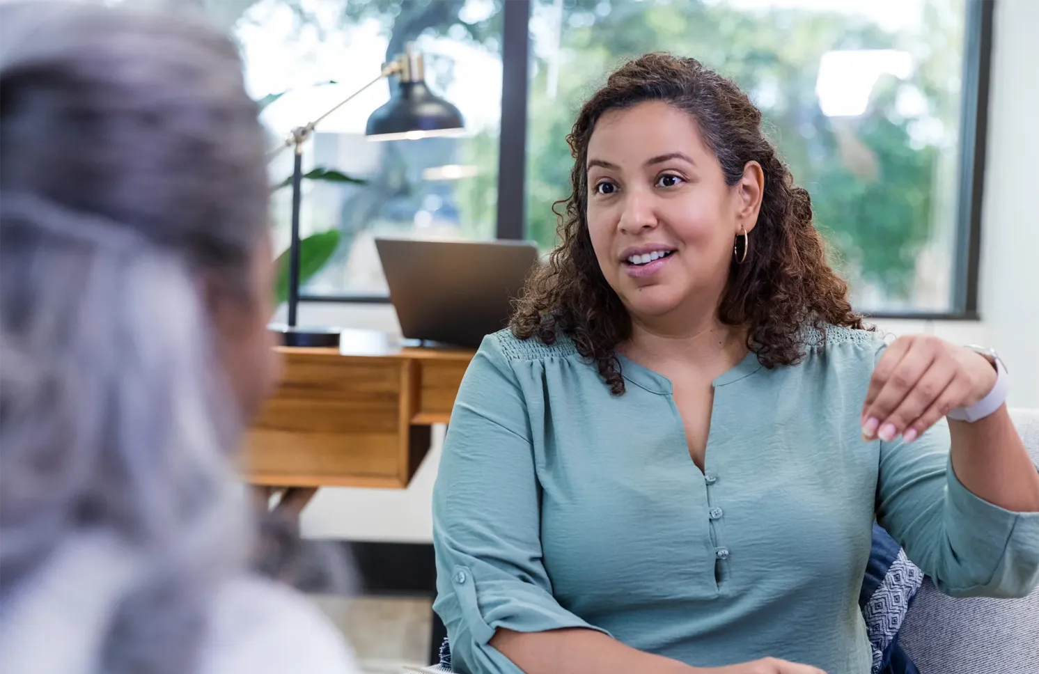 Doctor of Behavioral Health clinician conducting a counseling session with a patient