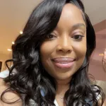 Pretty African American Woman posing for the camera