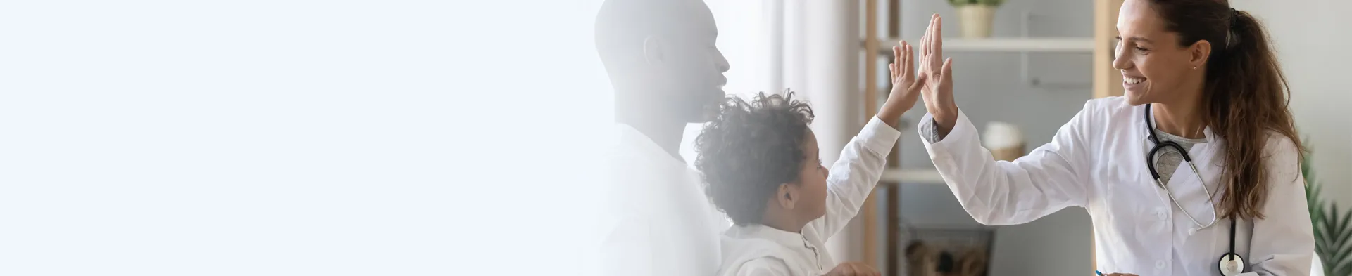 Family Nurse Practitioner FNP High Fiving Child Patient