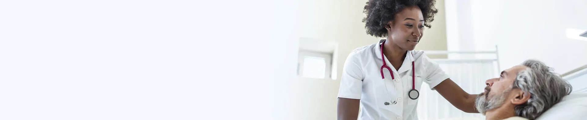 Adult Gerontology Acute Care Nurse Practitioner Who Went from BSN to AGACNP Treating Patient