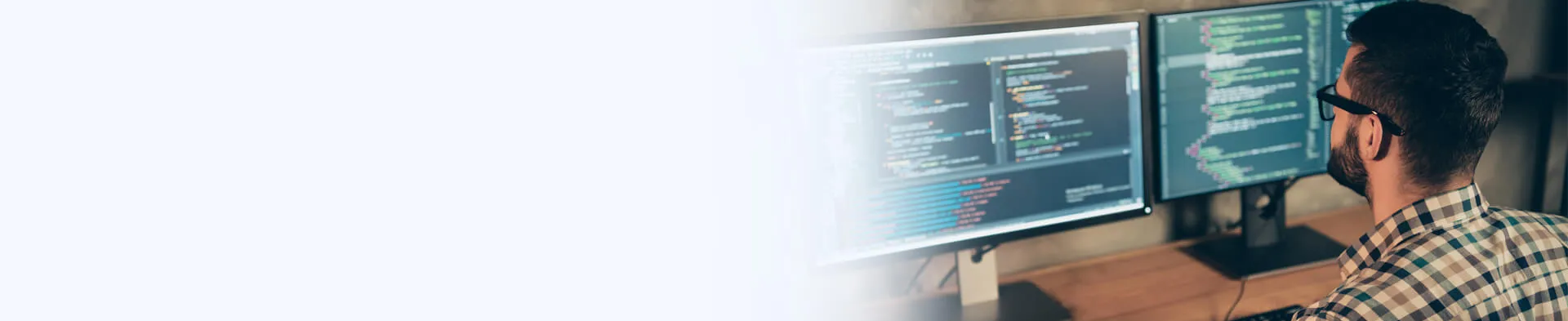 Coder with Computer Programming Bachelor's Degree Working in Front of Computer