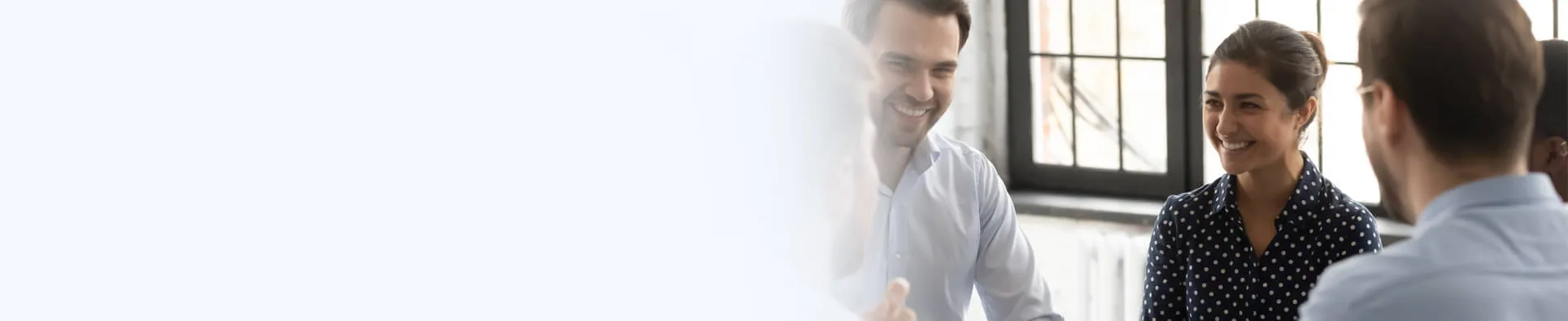 Human Services Worker with Associate Degree Smiling in Community Meeting
