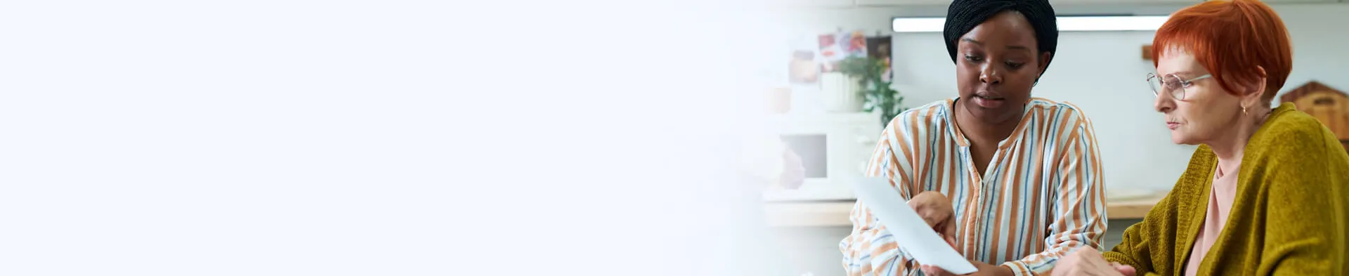 Social Worker Guiding Client Through Community Resource Documentation