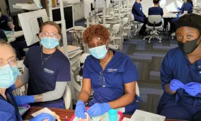 Herzing Surgical technology students in lab