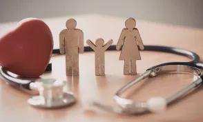Healthcare heart surrounding a family with child