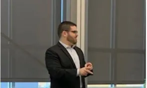 Corey Axelrod speaking at Herzing-Brookfield