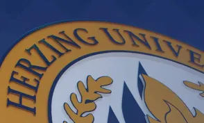 Herzing University seal