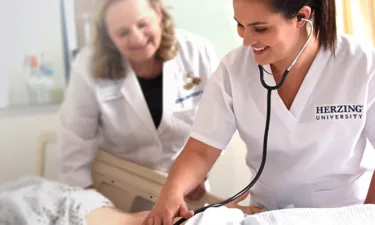 Teacher Who Went From MSN to Nurse Educator Instructing Nursing Student