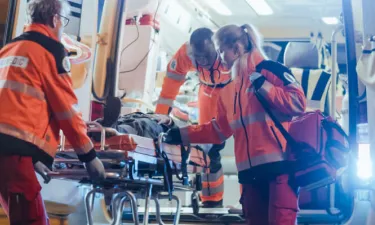 Team of Associate Degree Paramedics Helping Patient in Emergency in Birmingham Alabama