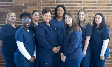 Nursing Student in Stethoscope Smiling in Nashville Nursing School Simulation Lab