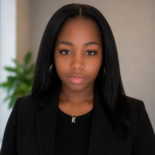 Professional headshot of an African American woman in professional business attire
