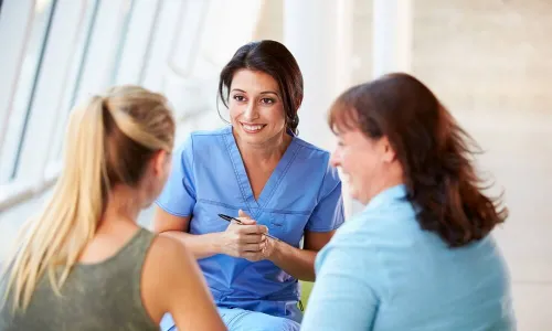 Registered Nurse with MSN Smiling with Happy Patients