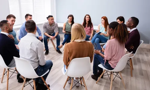 Social Worker Leading Group Discussion