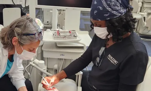 Dental Hygienist in Class with Instructor