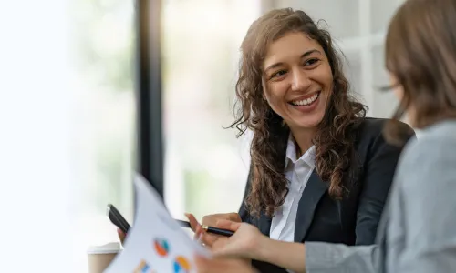 Project Manager Smiling During Meeting