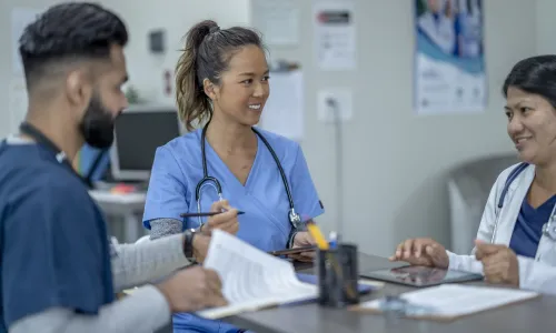 Nurse Practitioner Who Went from BSN to MSN Discussing Options with Patient