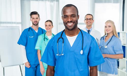 CVT to RN Online Students in Scrubs Smiling 