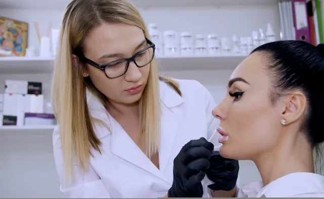 Cosmetic Registered Nurse Preparing Patient for Lip Procedure
