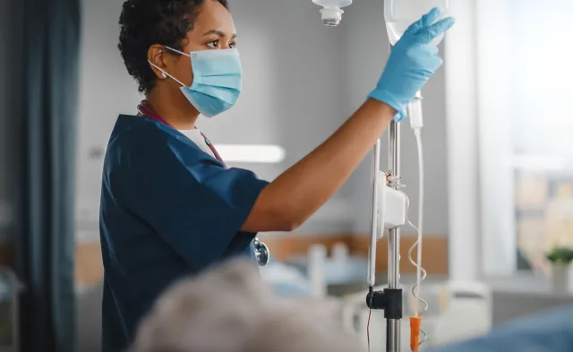Emergency Room Nurse (ER) Setting Up IV