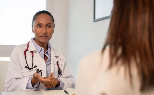 Nurse Practitioner Discussing Treatment Options with Patient