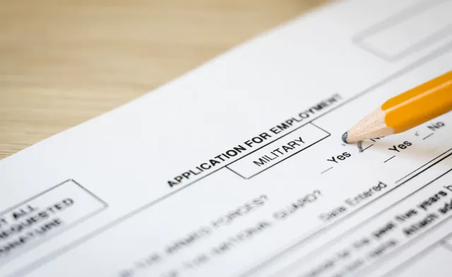 horizontal close up image of a job application for the military department