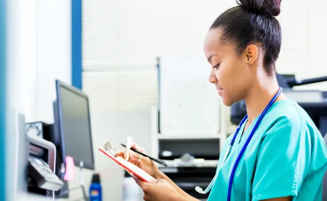 Nurse working at a computer