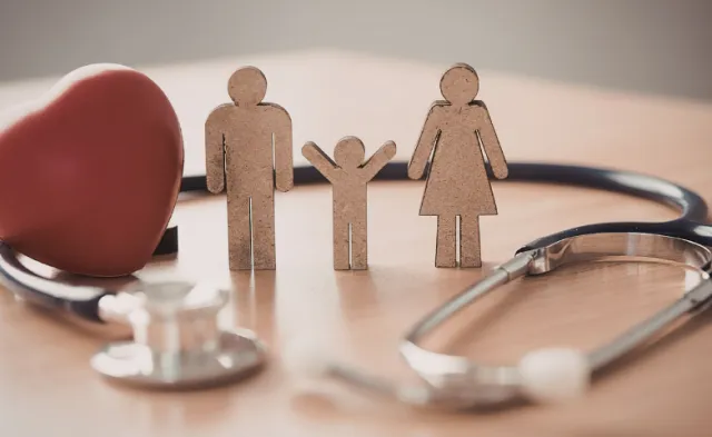 Healthcare heart surrounding a family with child