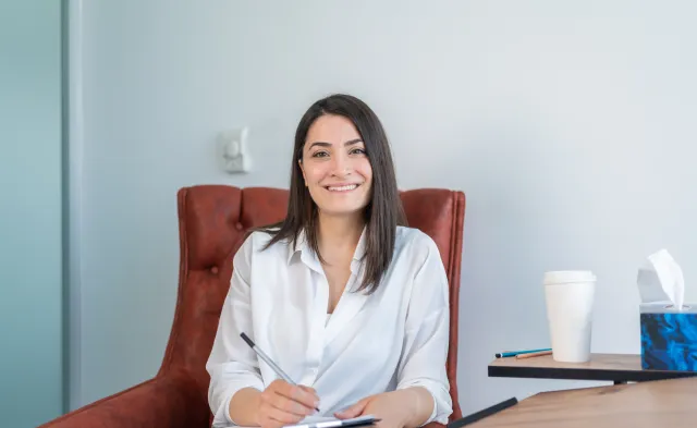 Portrait Of Female Psychologist In Office