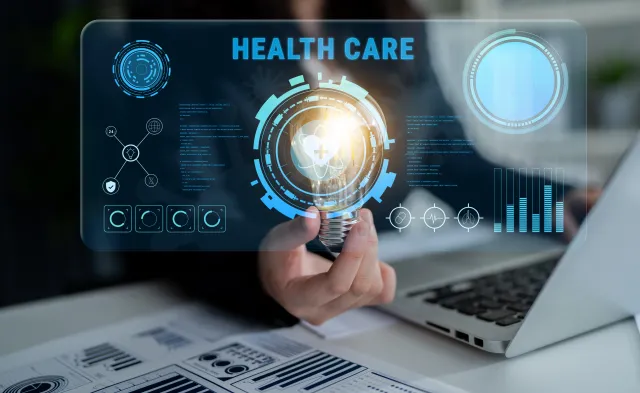 A healthcare technology concept showcases digital interfaces and metrics, emphasizing innovation in medical solutions within a professional workspace.