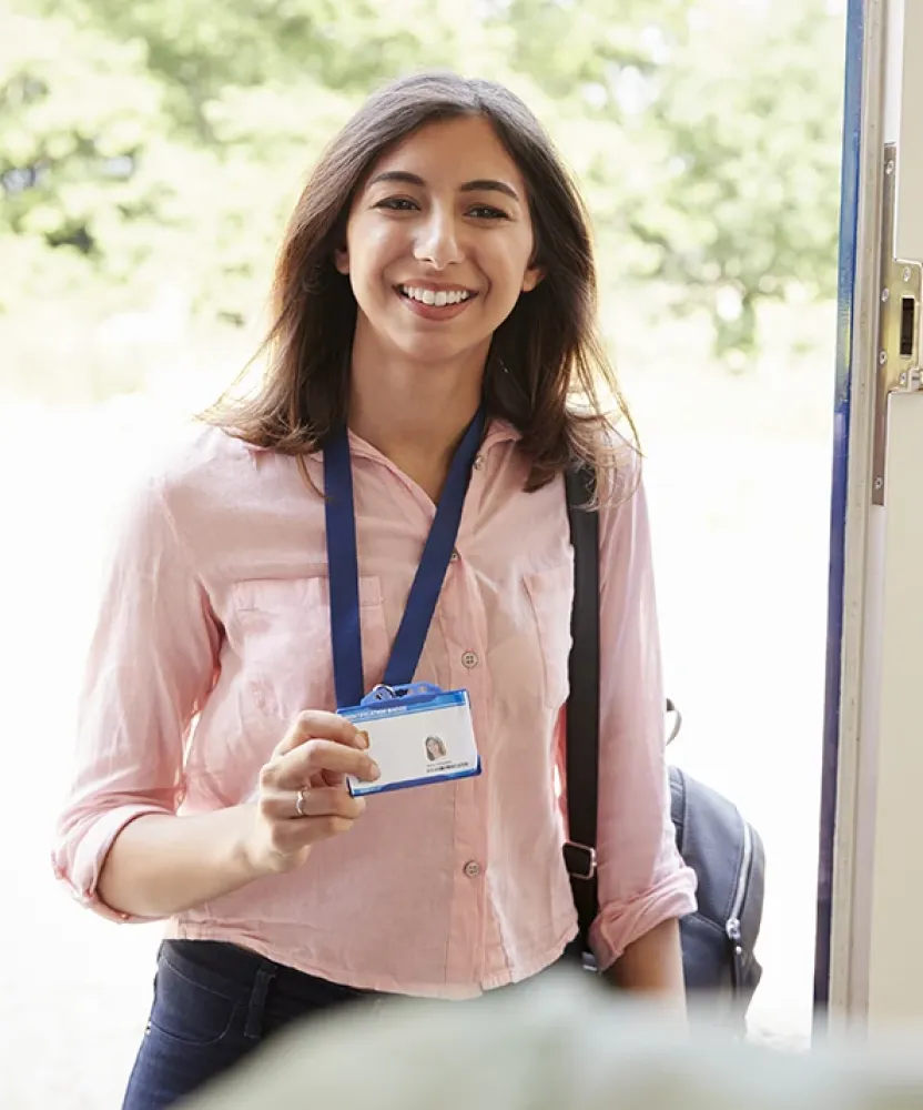 Social work professional arriving for a home visit, demonstrating real-world fieldwork experience supported by Herzing University’s Master in Social Work program.