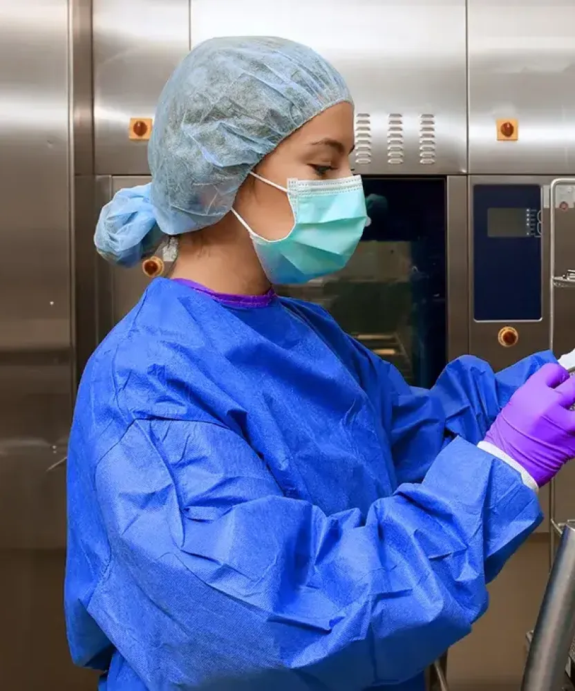 Sterile Processing Technician Cleaning Medical Instruments