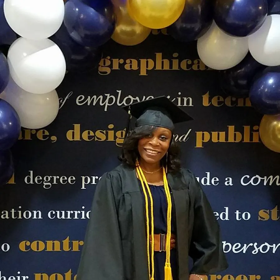 Sharese Windley graduation photograph in cap and gown