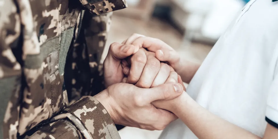 A Man Goes To Military Service. Saying Goodbye. Leaving To Army. Farewell With Family. Camouflage Uniform. Son Hanging. Feelings Showing. Guard Of Peace. Patriotic Decision. Soldier Emotion.