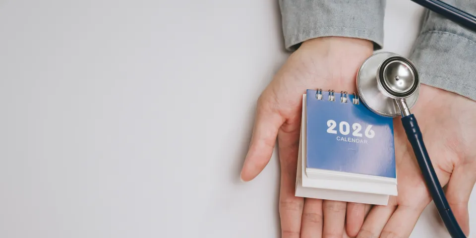 2026 calendar with stethoscope on open hand
