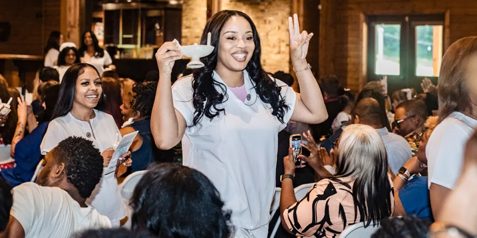 Herzing Nashville nursing graduate smiling during commencement ceremony
