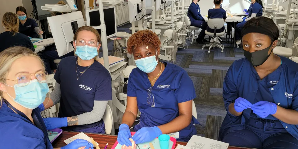Herzing Surgical technology students in lab