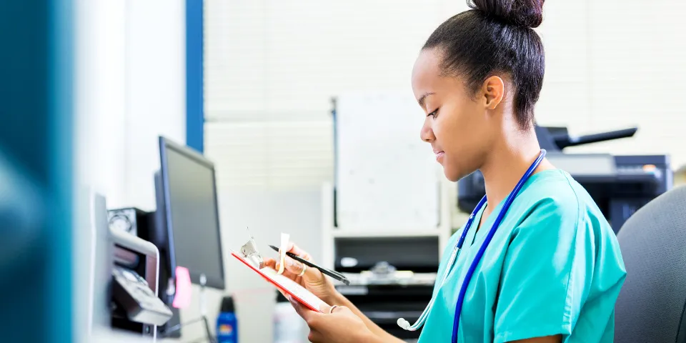 Nurse working at a computer